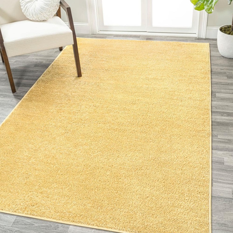 JONATHAN Y Haze Solid Low-Pile Mustard 10 ft. x 14 ft. Area Rug SEU100B-14