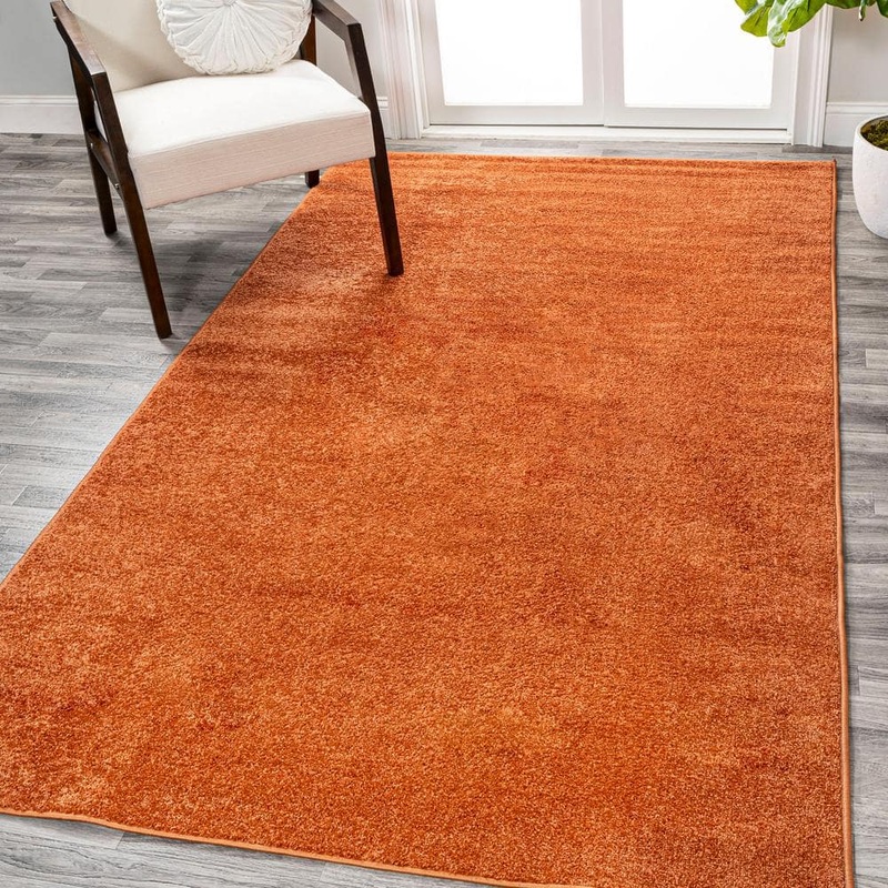 JONATHAN Y Haze Solid Low-Pile Orange 9 ft. x 12 ft. Area Rug SEU100M-9