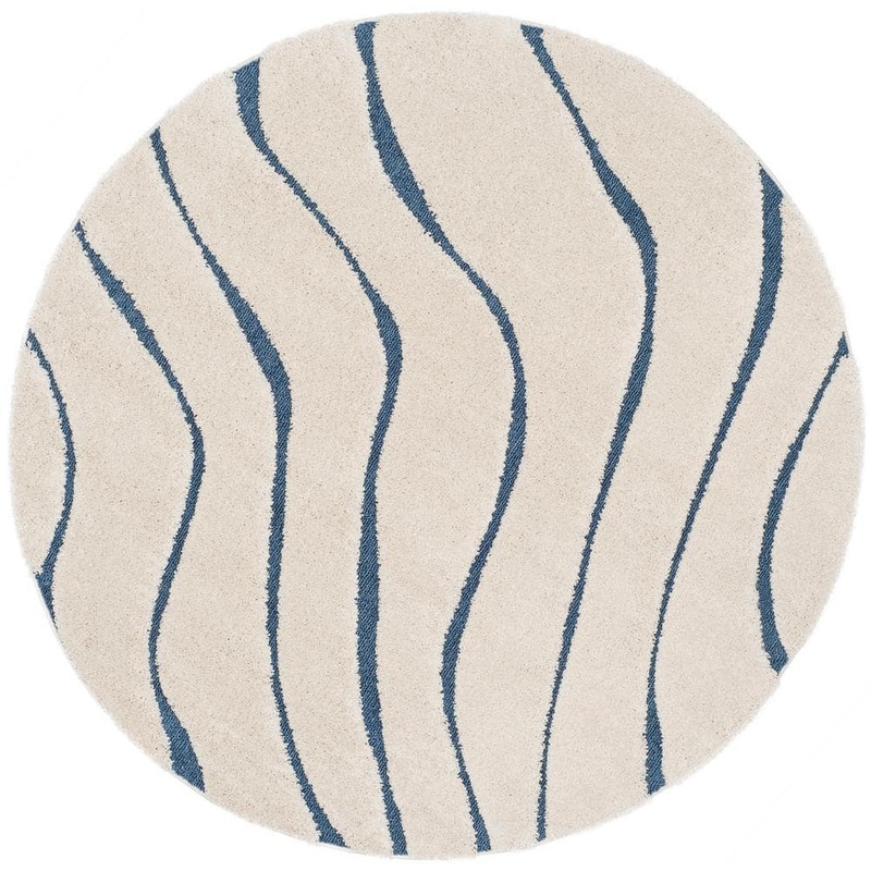 SAFAVIEH Florida Shag Cream/Blue 7 ft. x 7 ft. Round Solid Area Rug SG472-1165-7R